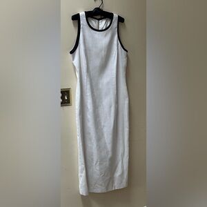 Elegant 100% linen White Sleeveless Dress with Black trim 

Vintage, never worn